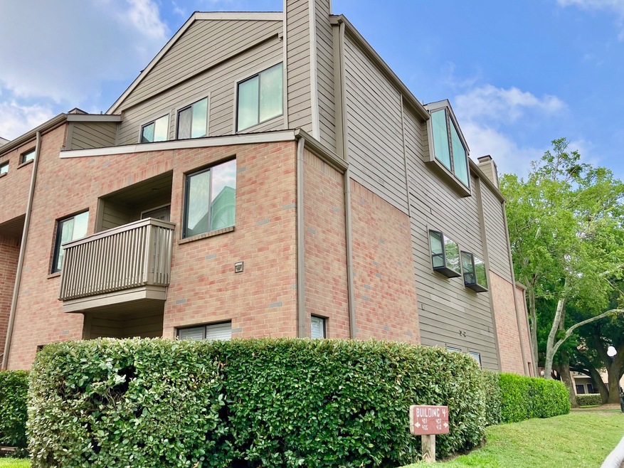 A corner unit with a bay window in the kitchen and