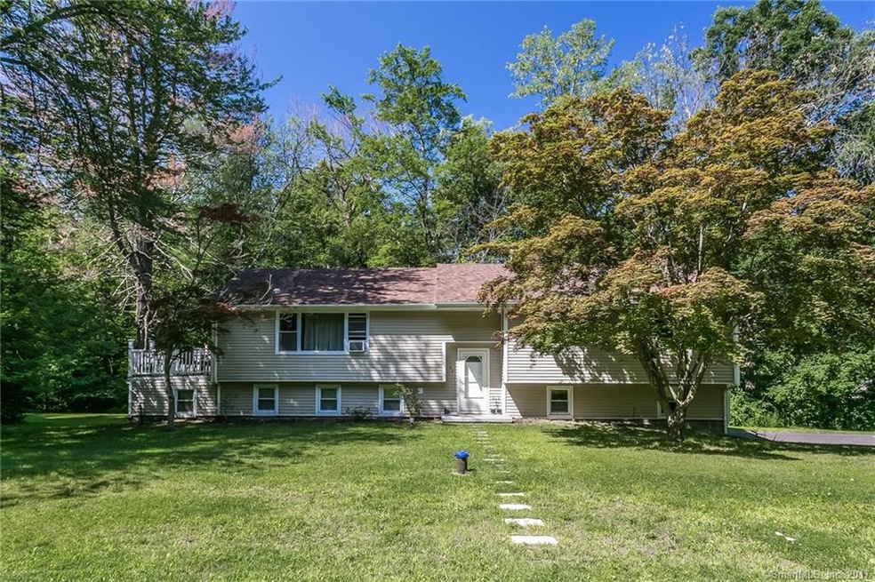 42 Foothills Way is situated on .78 acre lot with 