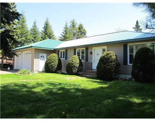 Exterior Front. Nice Flat Lawn