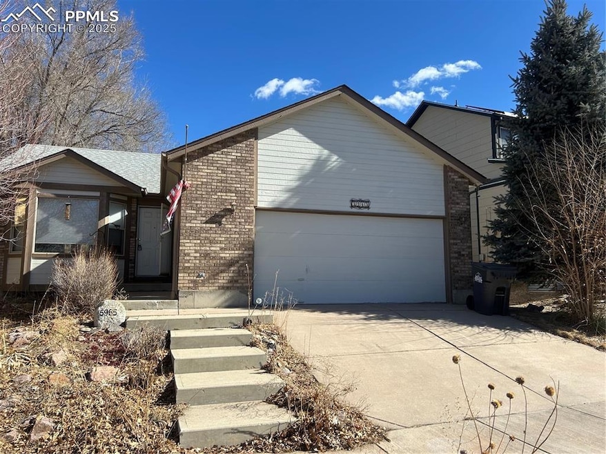 View of front of home featuring a garage