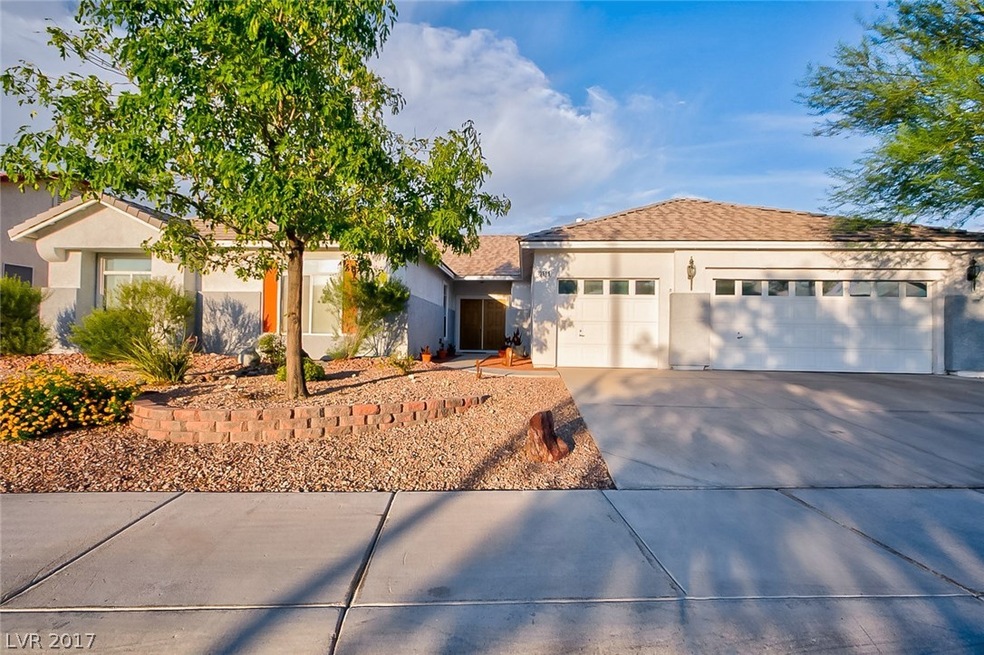Front of home - note spacious 3-car garage