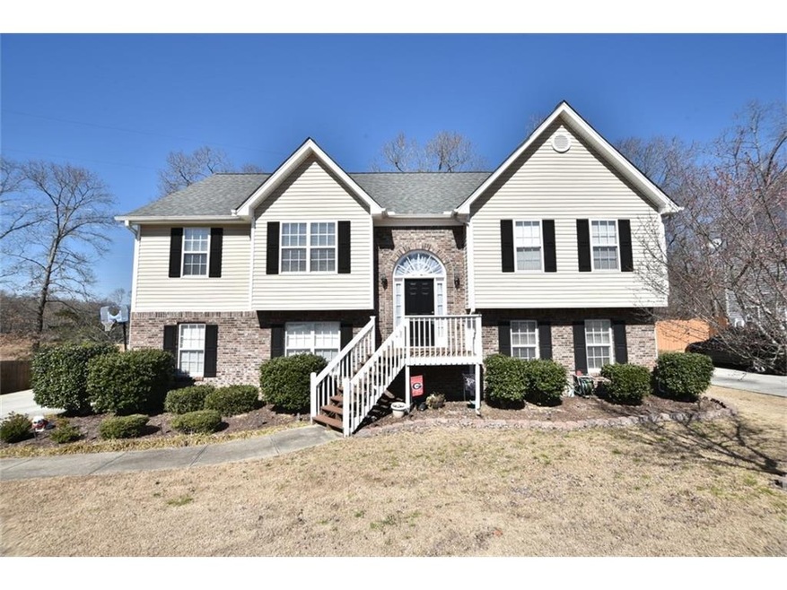 Charming 4 bedroom, 3 full bath home on large lot!