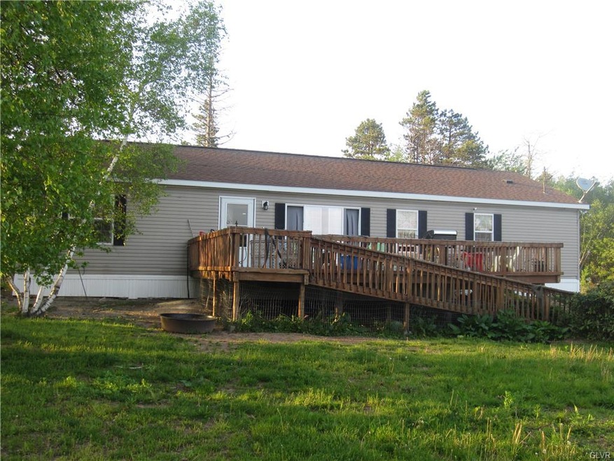 Front View of home and yard
