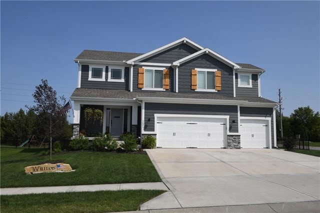 1601 Grandshire Dr, Raymore, MO 64083 - photo 1