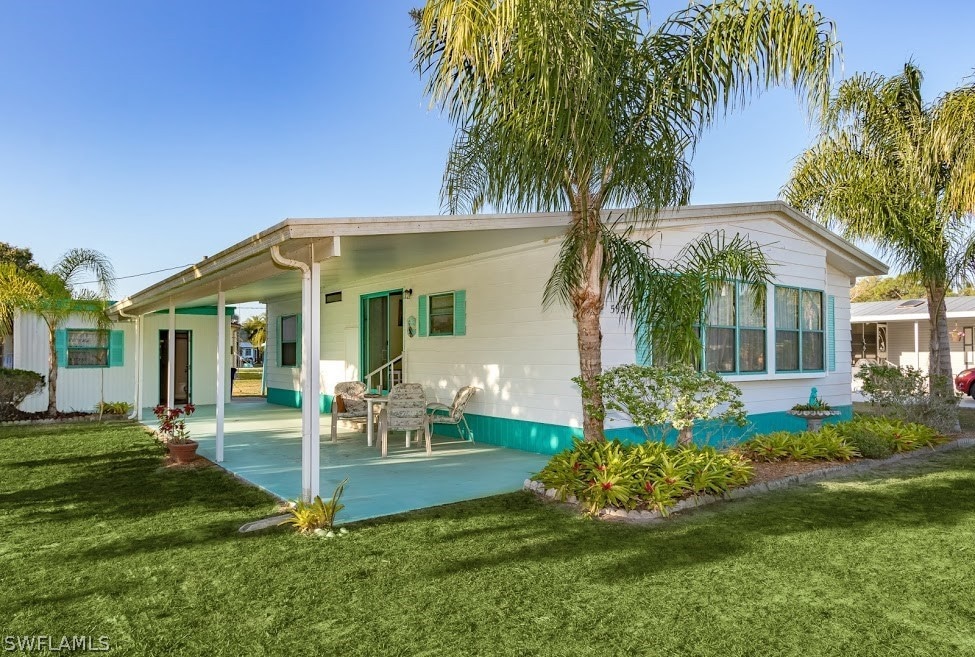 5921 Wisconsin St, Bokeelia, FL 33922 - photo 1