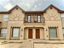 View of front of home featuring a balcony