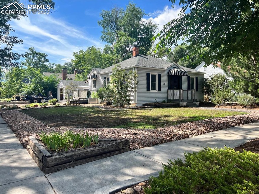 Adorable  home with detached garage on large corne