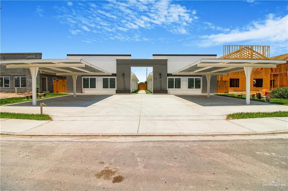 View of front of home with a carport