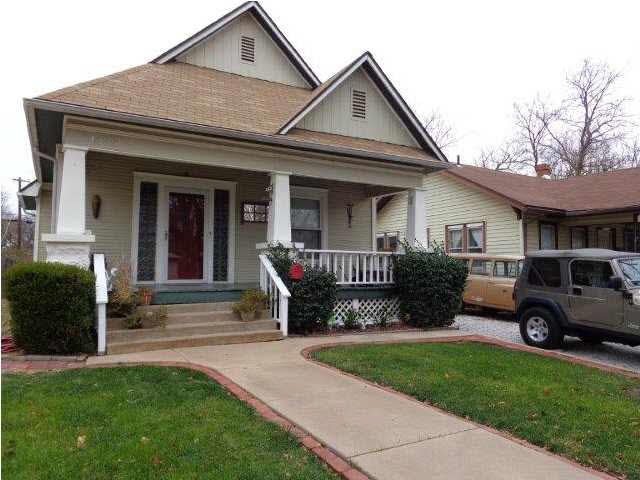 CRAFTSMAN STYLE WITH BIG FRONT PORCH.