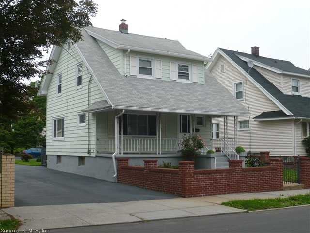 Exterior Front. Vinyl-Sided Exterior with Front Po