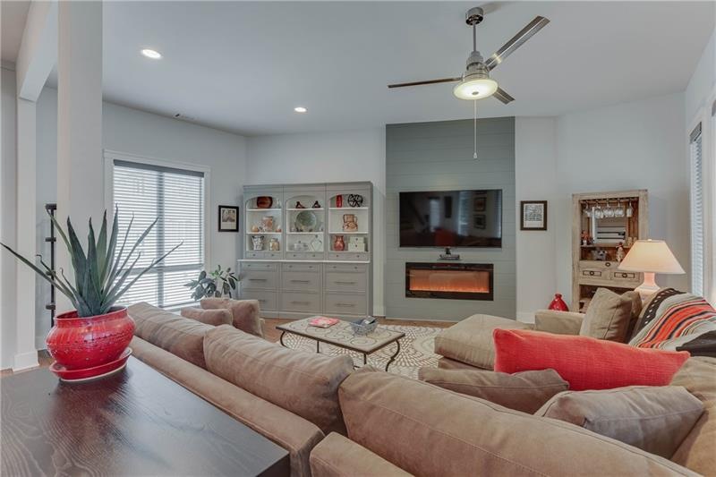 Sunny living room with built-ins
