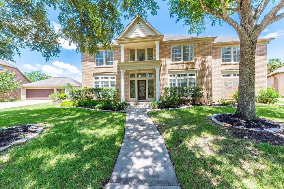 Stately customized home with 3-car detached garage