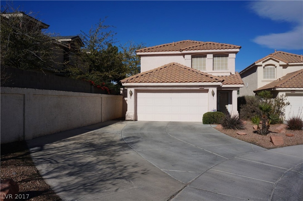 Extra Large driveway leading up to home