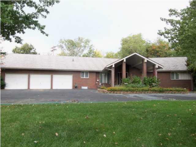 Front view of house w/3-car garage