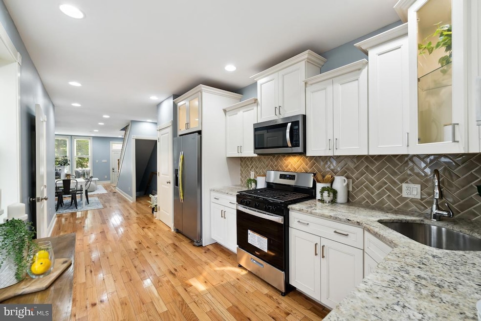 1424 E Oliver St, Baltimore, MD 21213 - photo 1