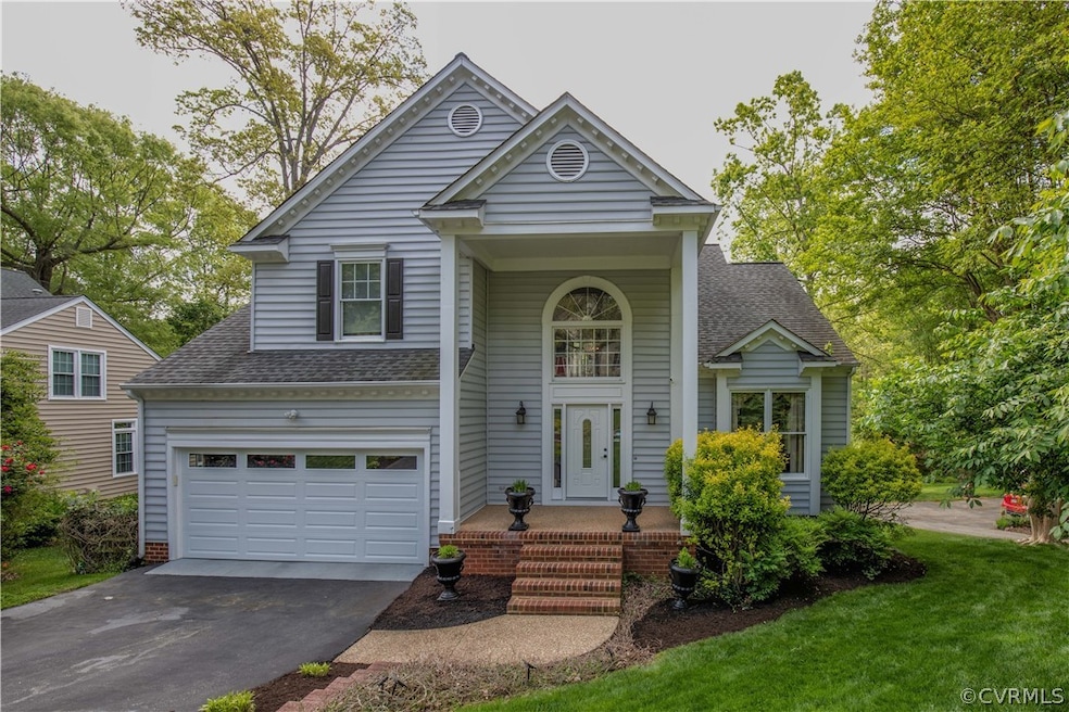 View of front of home featuring a garage and a fro