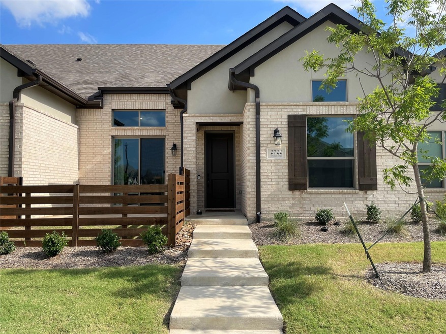 View of front of home featuring a front lawn