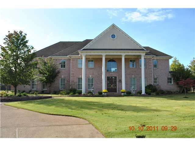 Impressive home at the end of Grove Trail Cove.  Y