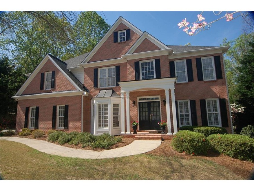 This impeccable southern home on a beautiful lot w