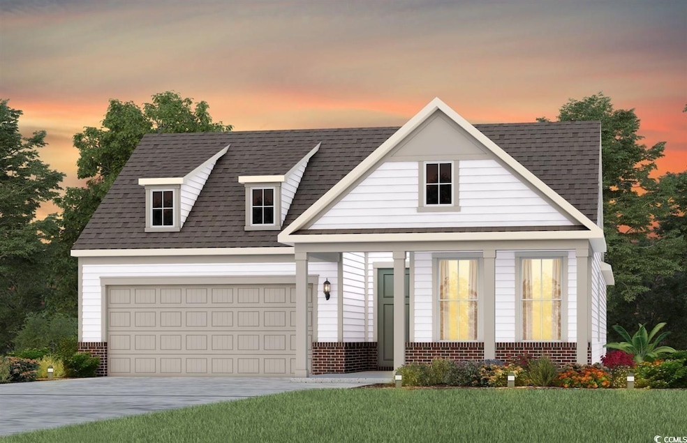 View of front of home with brick siding, concrete 
