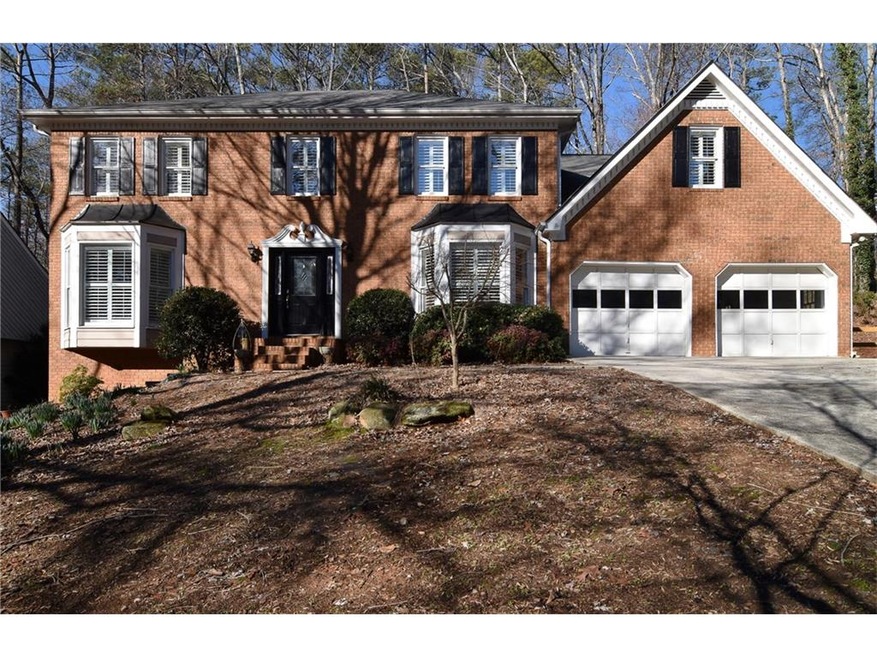 Welcome home!  Front yard landscaped with Japanese