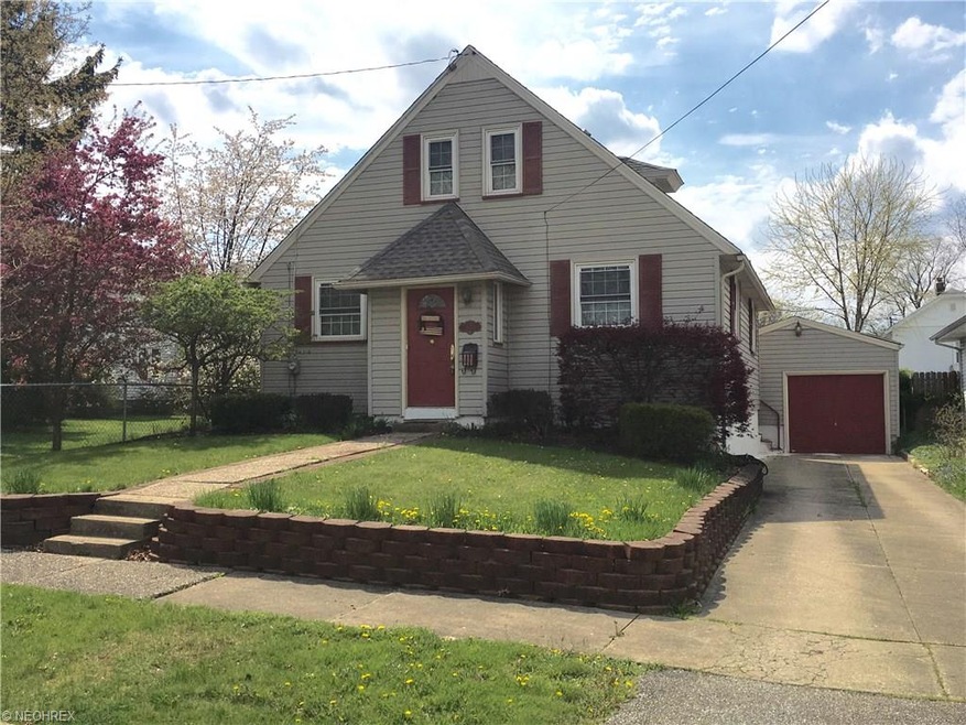 FRONT VIEW. NEWER LANDSCAPING BRICKS, VINYL SIDING