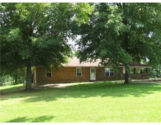 Exterior Front. Situated on almost 3 acs with stoc