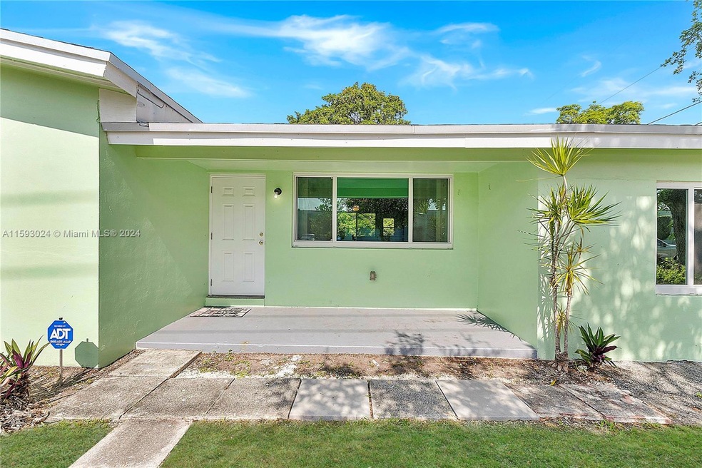 910 Phippen Waiters Rd, Dania, FL 33004 - photo 1