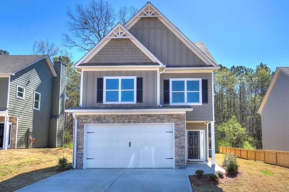 Craftsman inspired home featuring board and batten
