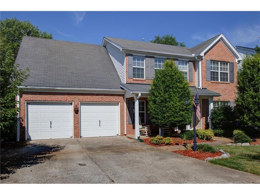 Two car garage and rocking chair front porch!