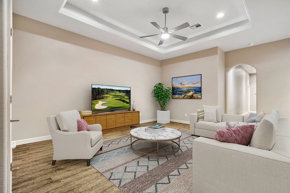 Living Area, Virtually Staged, is sizeable for eas