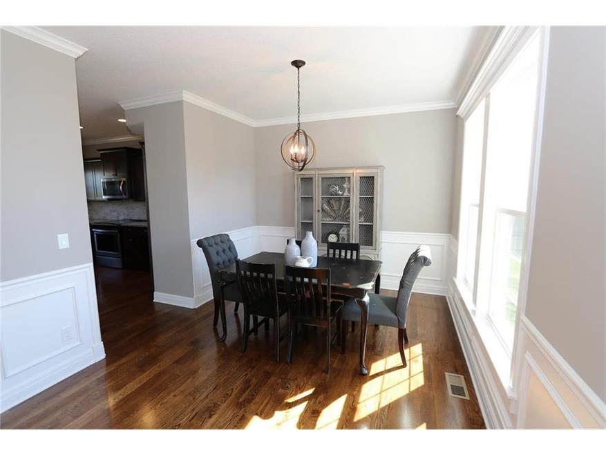 1524 Wildwood Cir, Raymore, MO 64083 - photo 1