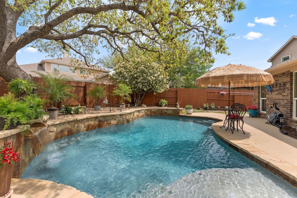View of pool with a gazebo, a fenced backyard, a 