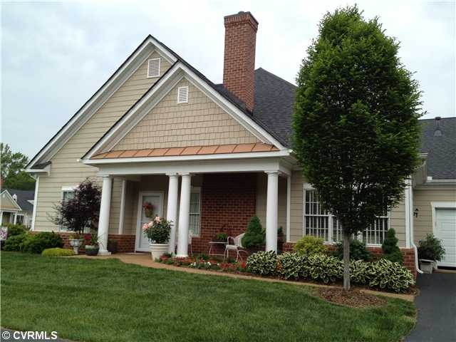 Exterior Front - Gorgeous Flowers and Shrubs in th