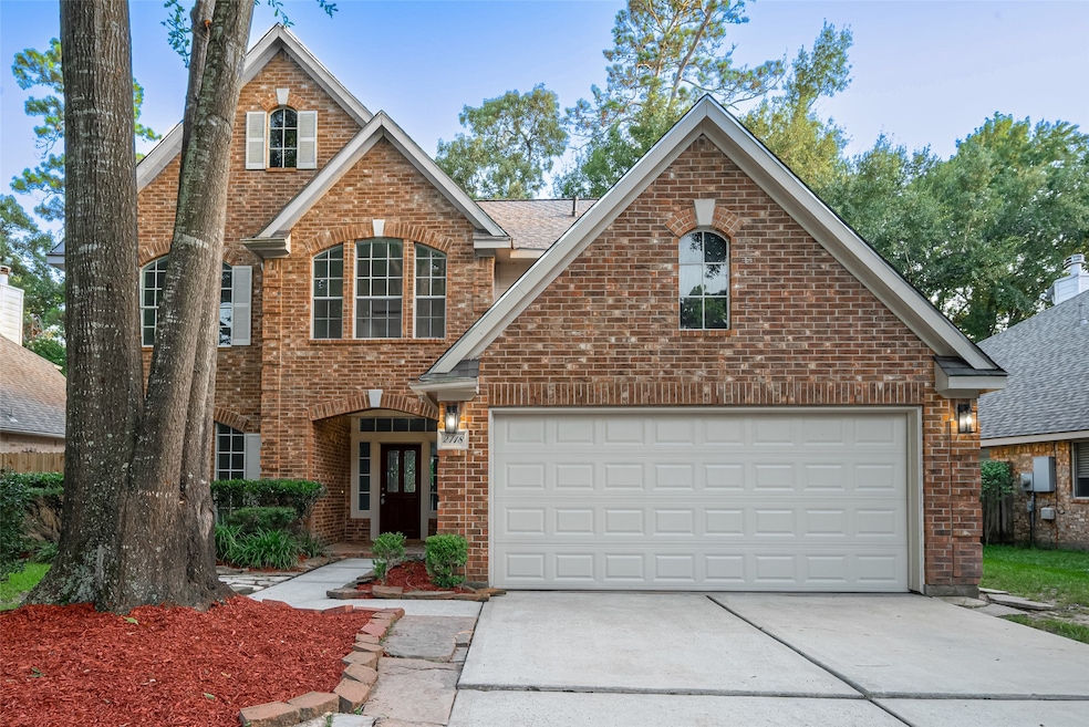 Beautiful brick-front traditional home with double