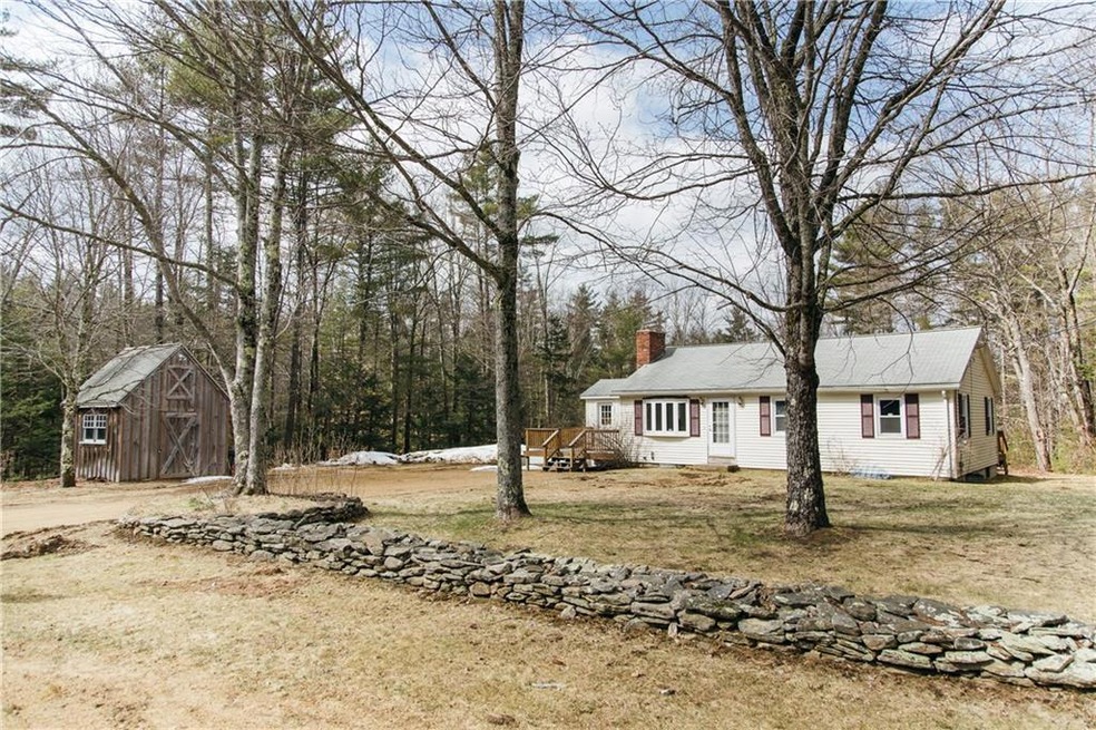 An appealing stone wall greets you...