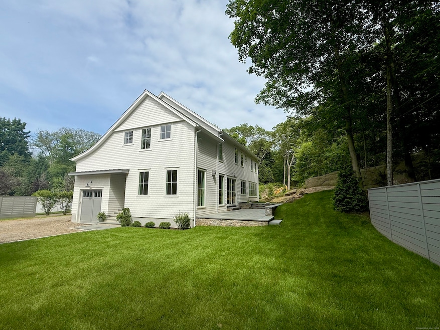 Significantly set back from the road on a rear lot with remarkable serenity and privacy from any neighbor.