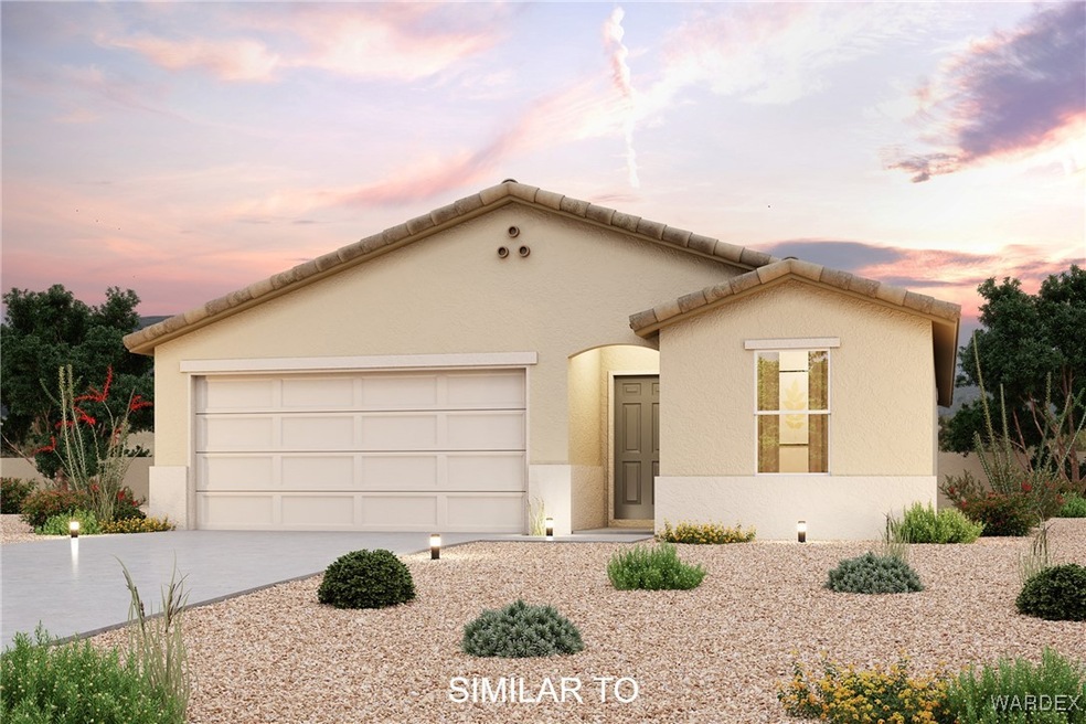 View of front facade featuring a garage
