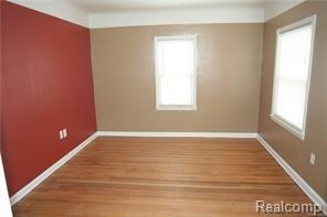LIVING ROOM WITH HARDWOOD FLOORING
