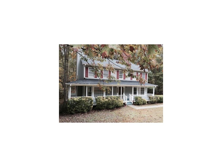 Front view showing wraparound porch!