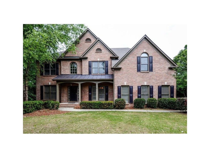This three sided brick home offers curb appeal gal