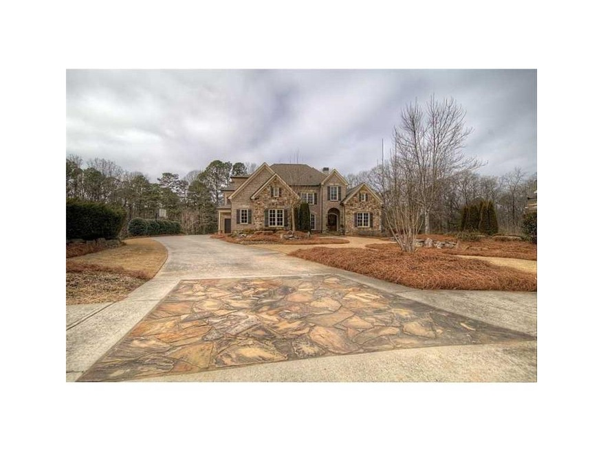Exterior Front. Stunning Stone and Brick Home Situ