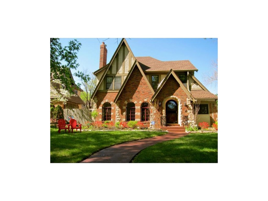 Tudor Home - Manicured Lawn and Landscaping - Roof