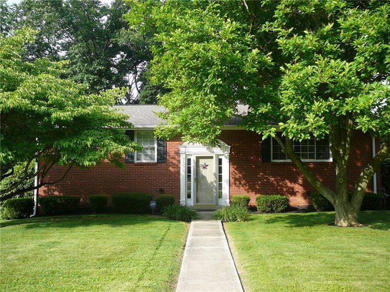 Front view of 108 Shippen Drive, manicured lawn, m