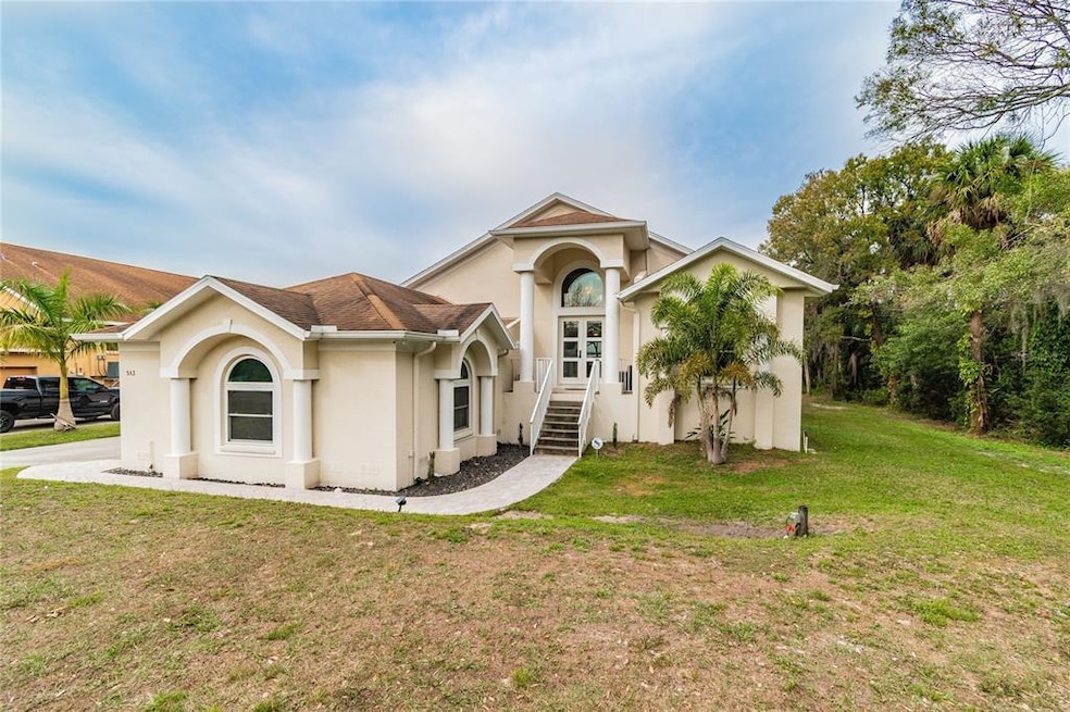 513 S 52nd St, Tampa, FL 33619 - photo 1