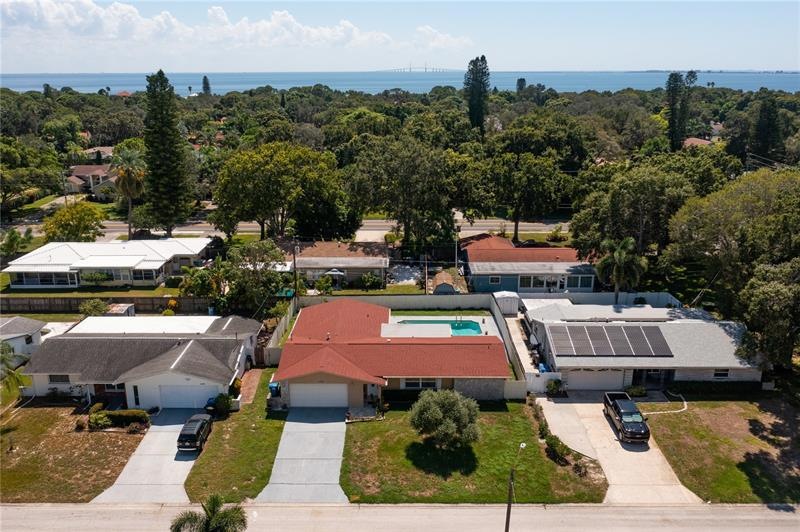 Aerial photo of the property with the Skyway Bridge in the background.