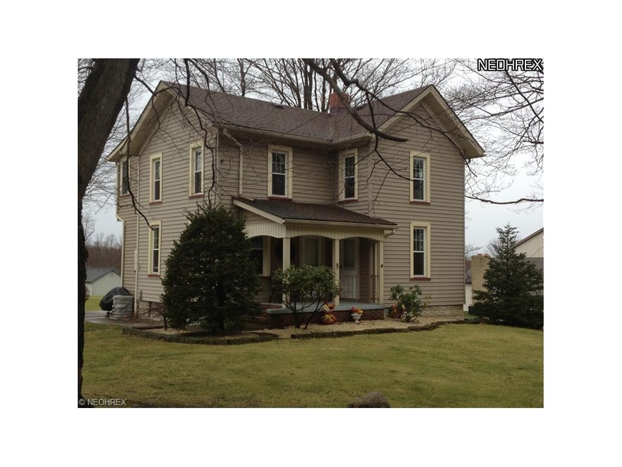 Vinyl sided exterior with front porch.  Newer roof