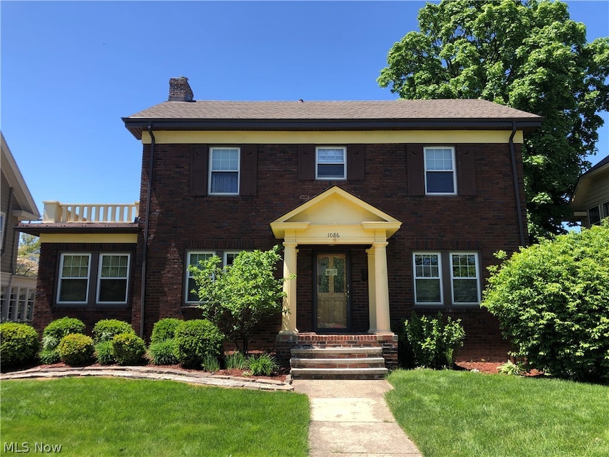 Brick center hall Colonial