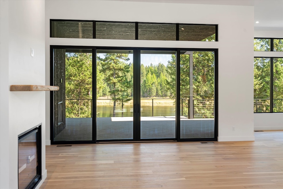 over sized sliding doors leading to the large upper deck.