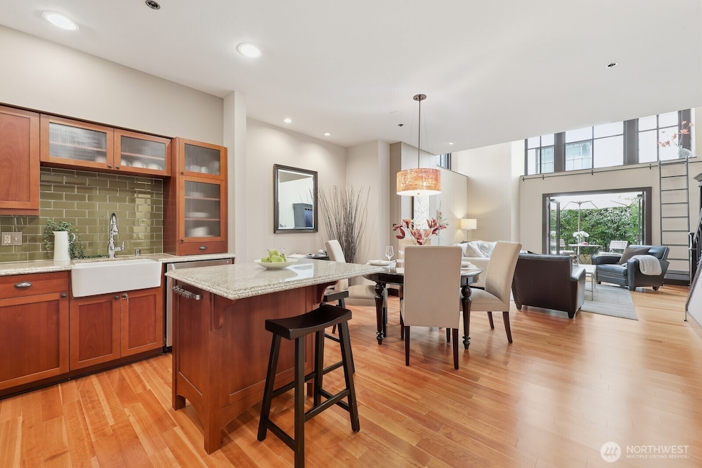 Step into this beautiful Queen Anne corner loft.